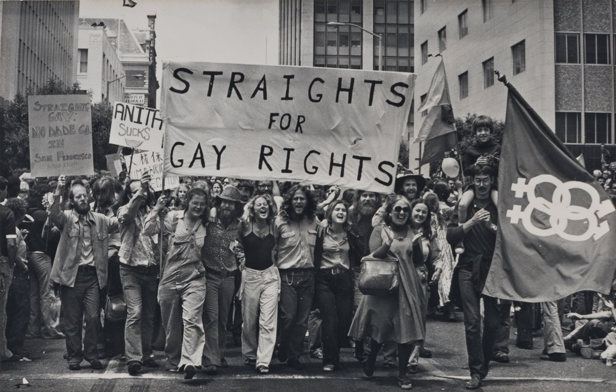 MARIE UEDA (1942 - )  A pair of real photo postcards from the 1977 San Francisco Gay Day Parade.